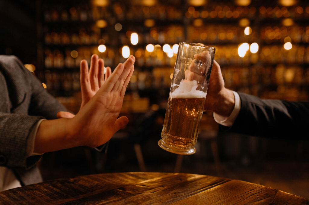 person saying no to alcohol