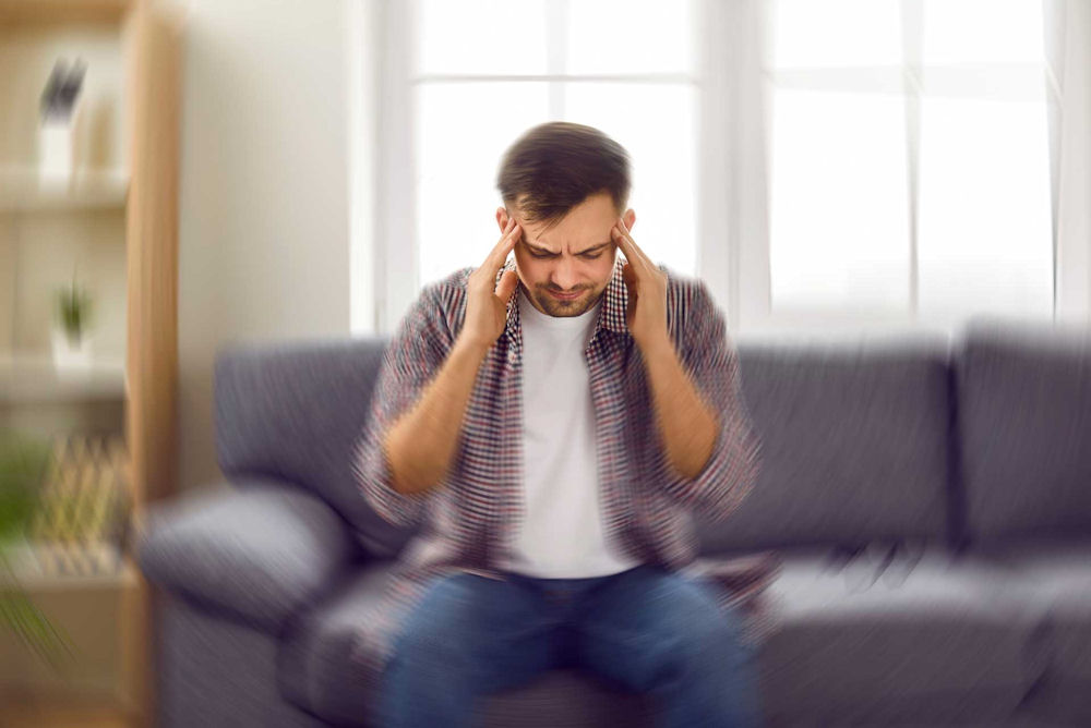 person experiencing dizziness and confusion from inhalant use