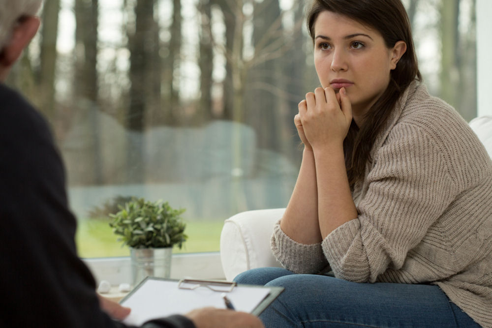 woman attending therapy or counseling for worsening depression and anxiety linked to trazodone abuse